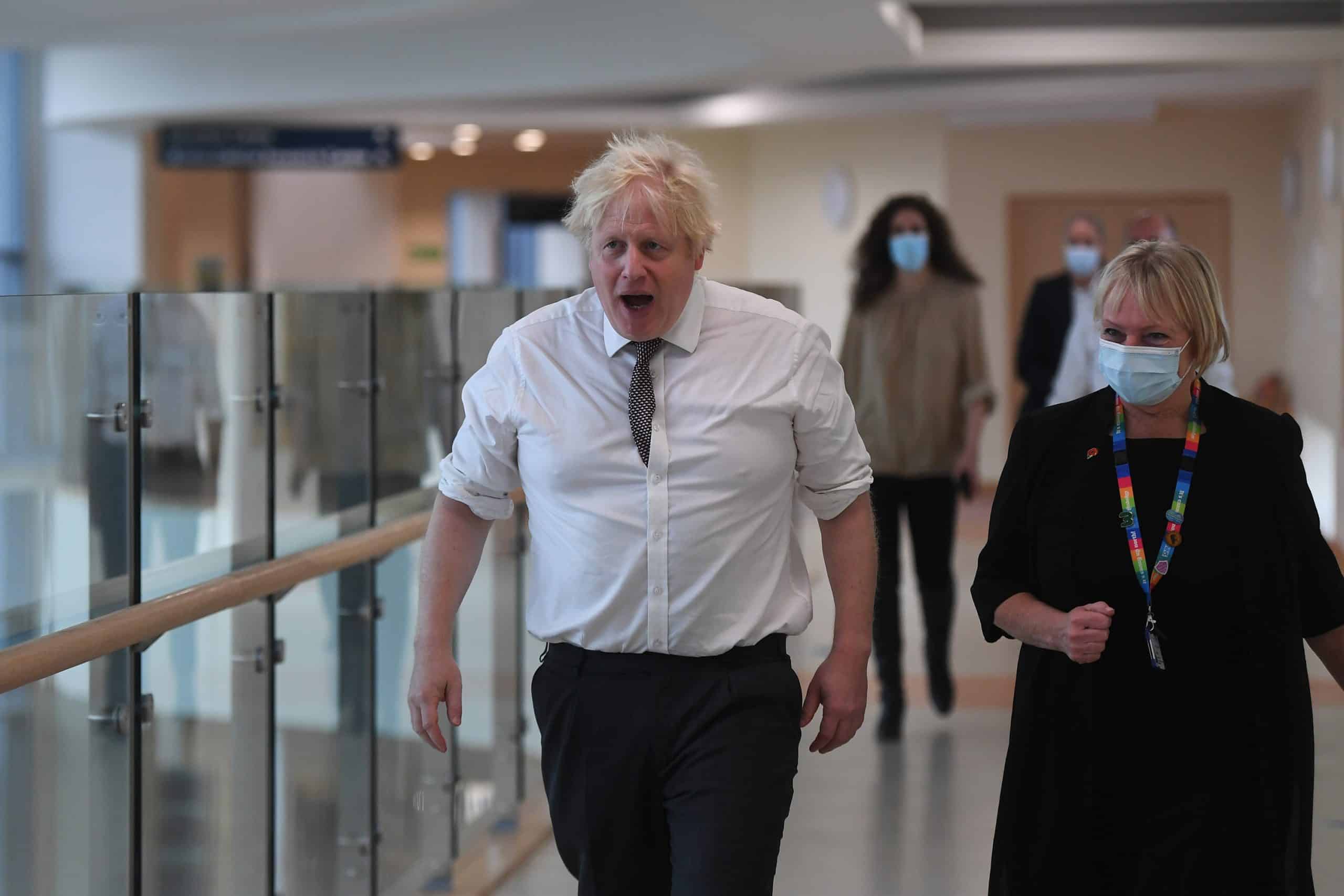 Boris flouts mask guidelines – again – at busy London theatre