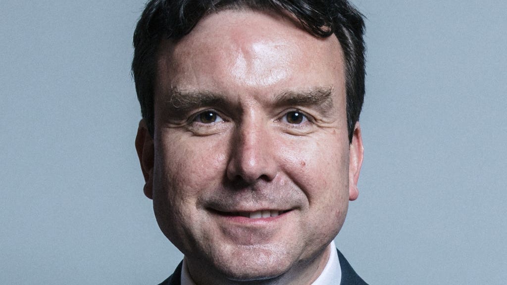 Ex-Tory minister Andrew Griffiths raped his wife, family court judge finds