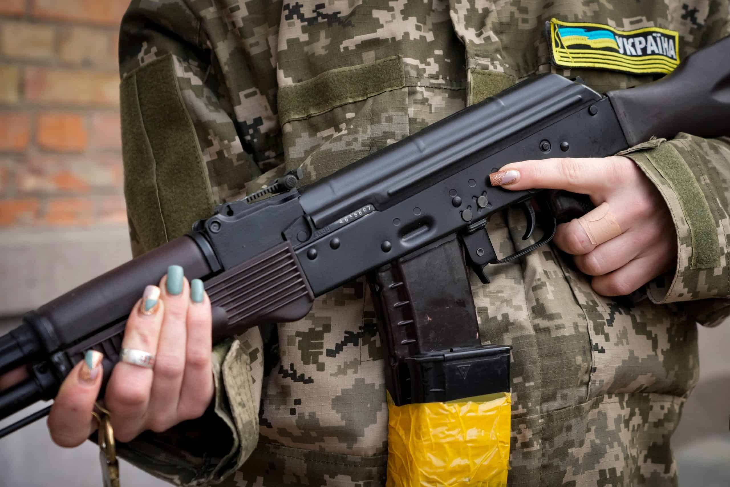 Former Miss Ukraine takes up arms to fight off Russian invaders