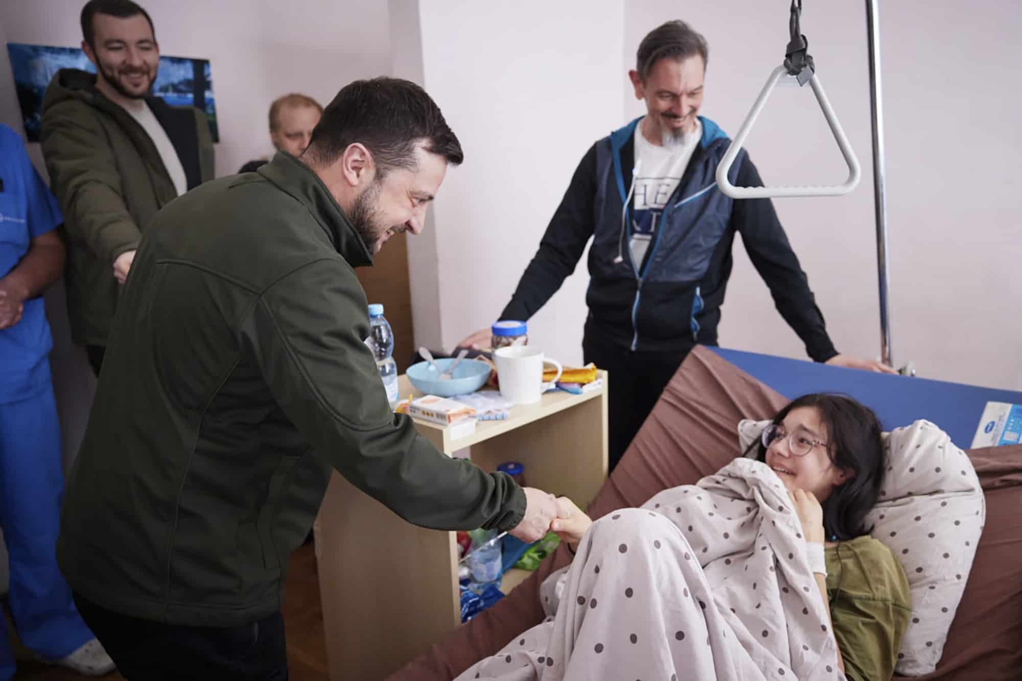 Watch: Young girl weeps as Zelensky visits her in hospital
