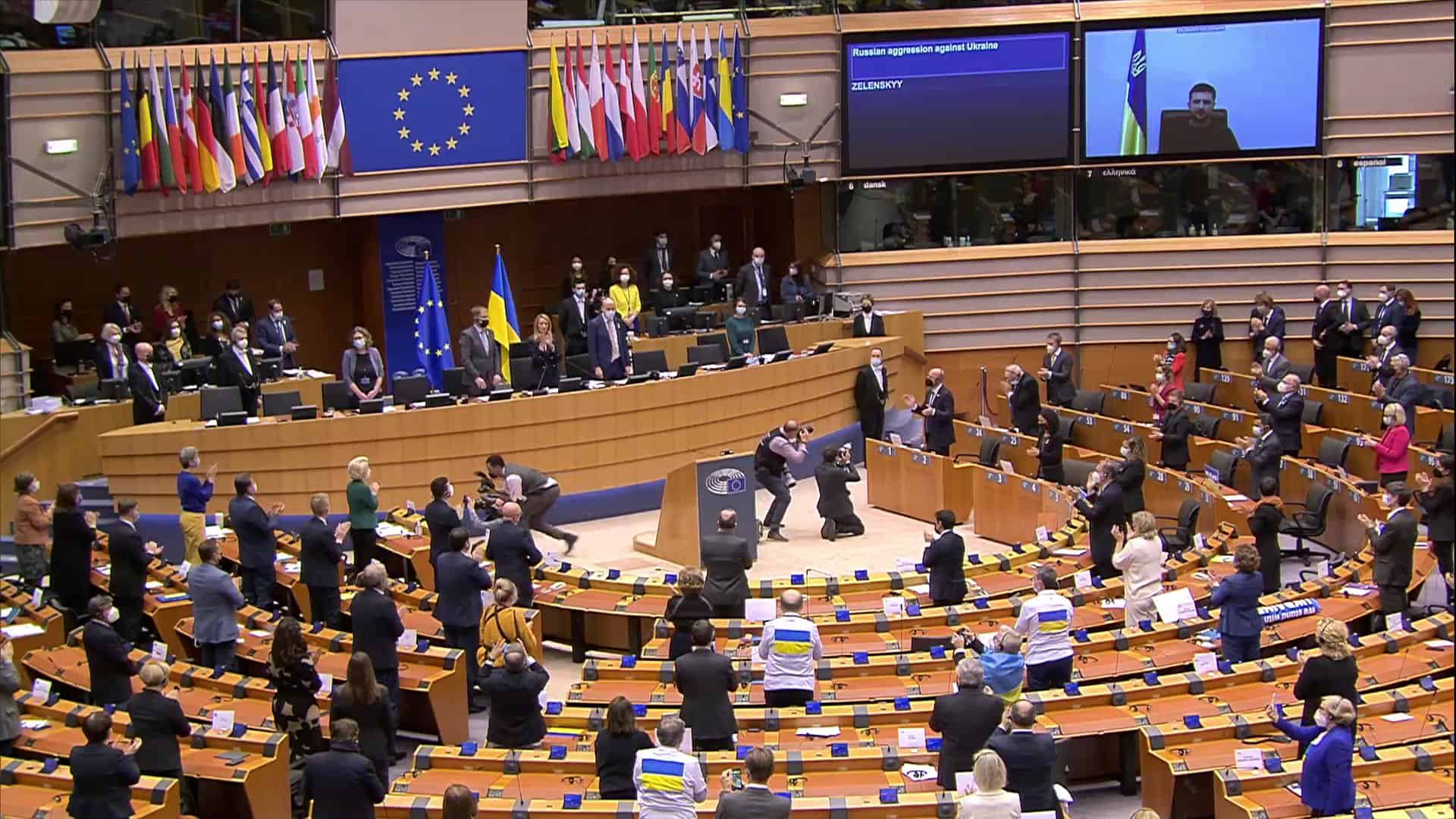‘Life will conquer death’: Zelensky given emotional standing ovation by EU Parliament