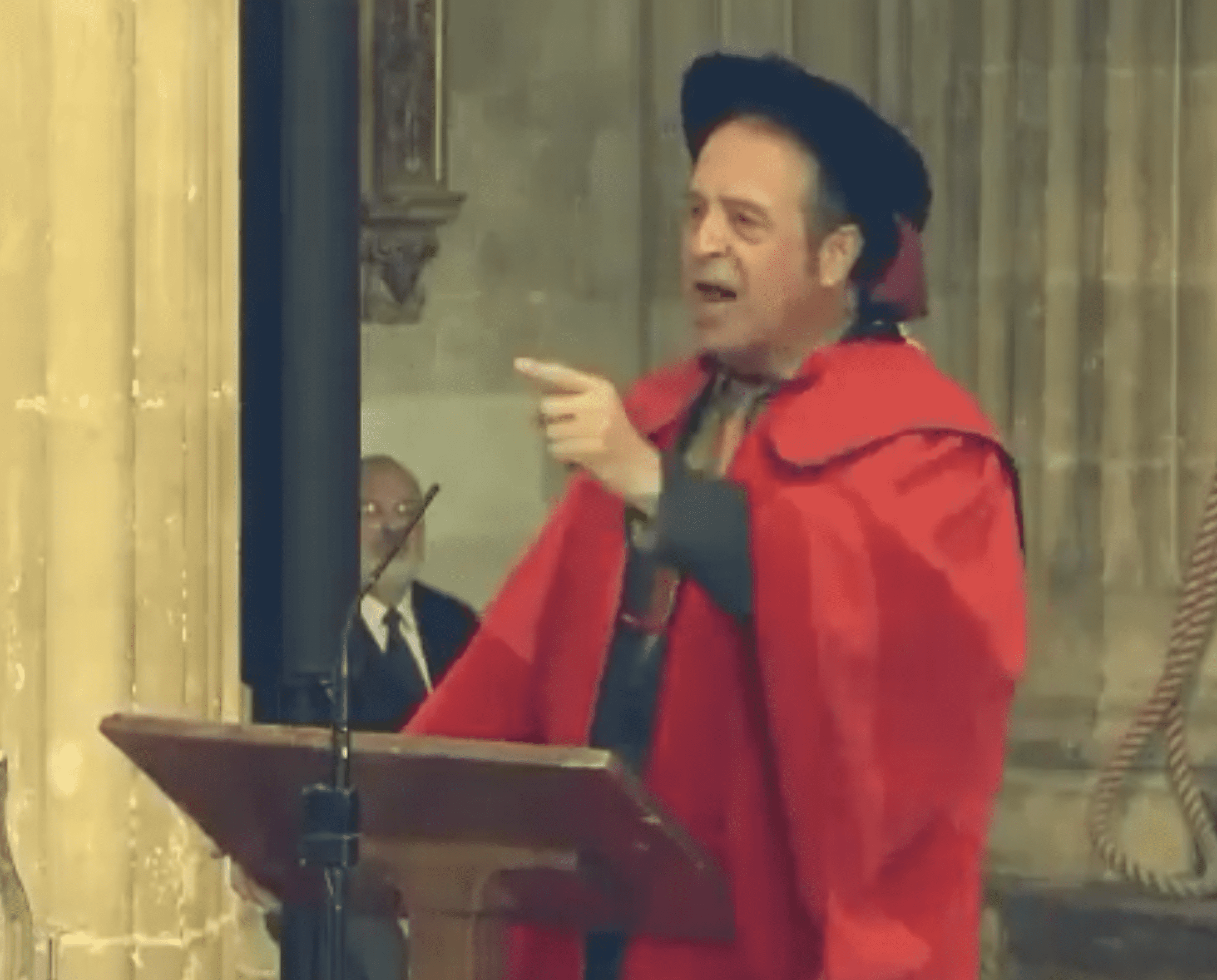 Watch: Comedian and activist Mark Thomas crucifies Johnson at graduation ceremony