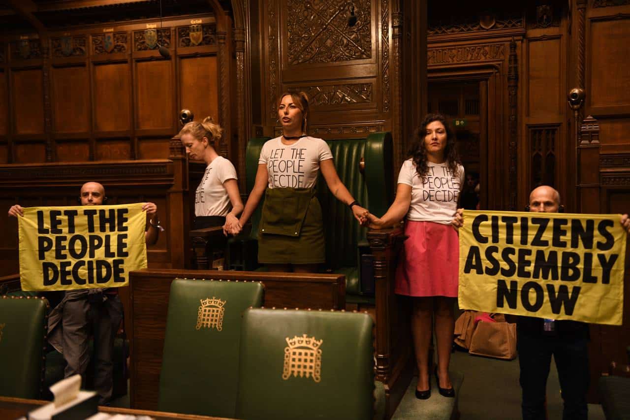 Watch: Extinction Rebellion superglued themselves inside Commons chamber